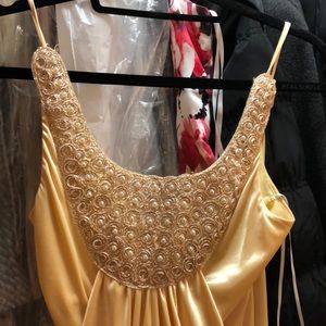 Yellow dress with pearls